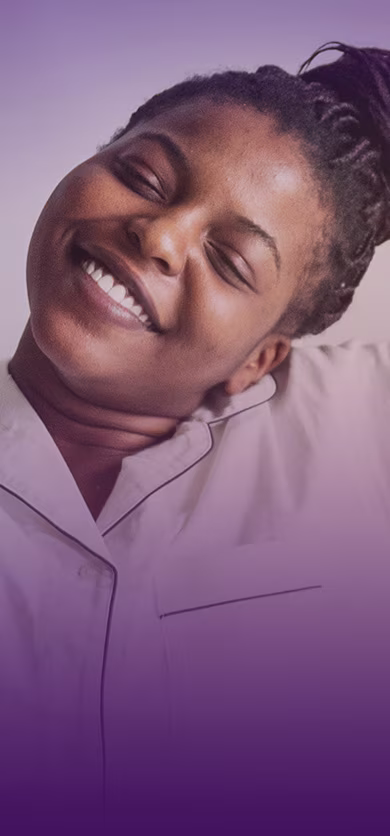 Close-up of person in light pajamas with purple gradient overlay.