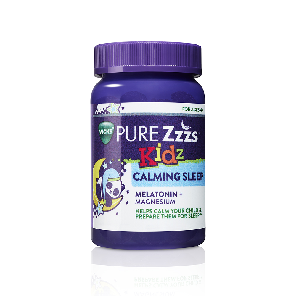 Purple bottle of PURE Zzzs Kidz Calming Sleep Melatonin + Magnesium gummies.