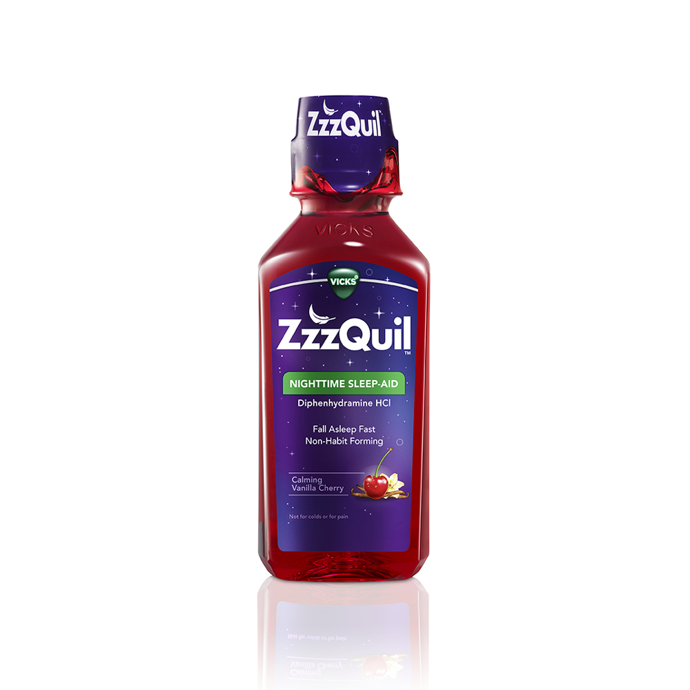 Red bottle of ZzzQuil Calming Vanilla Cherry Liquid.