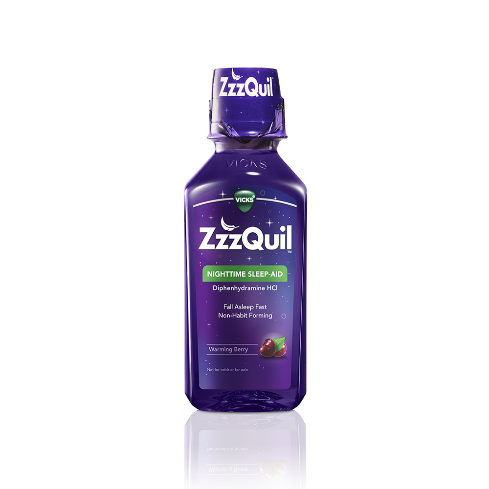 Purple bottle of ZzzQuil Nighttime Sleep-Aid Warming Berry Liquid.